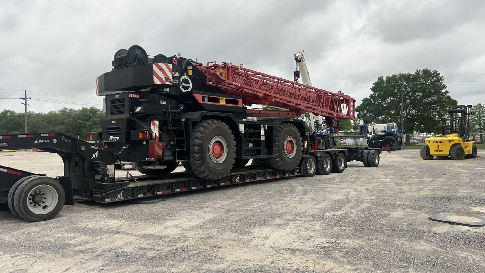 Heavy machinery equipment secured for delivery