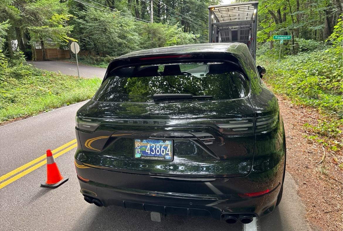Luxury Porsche vehicle during enclosed transport