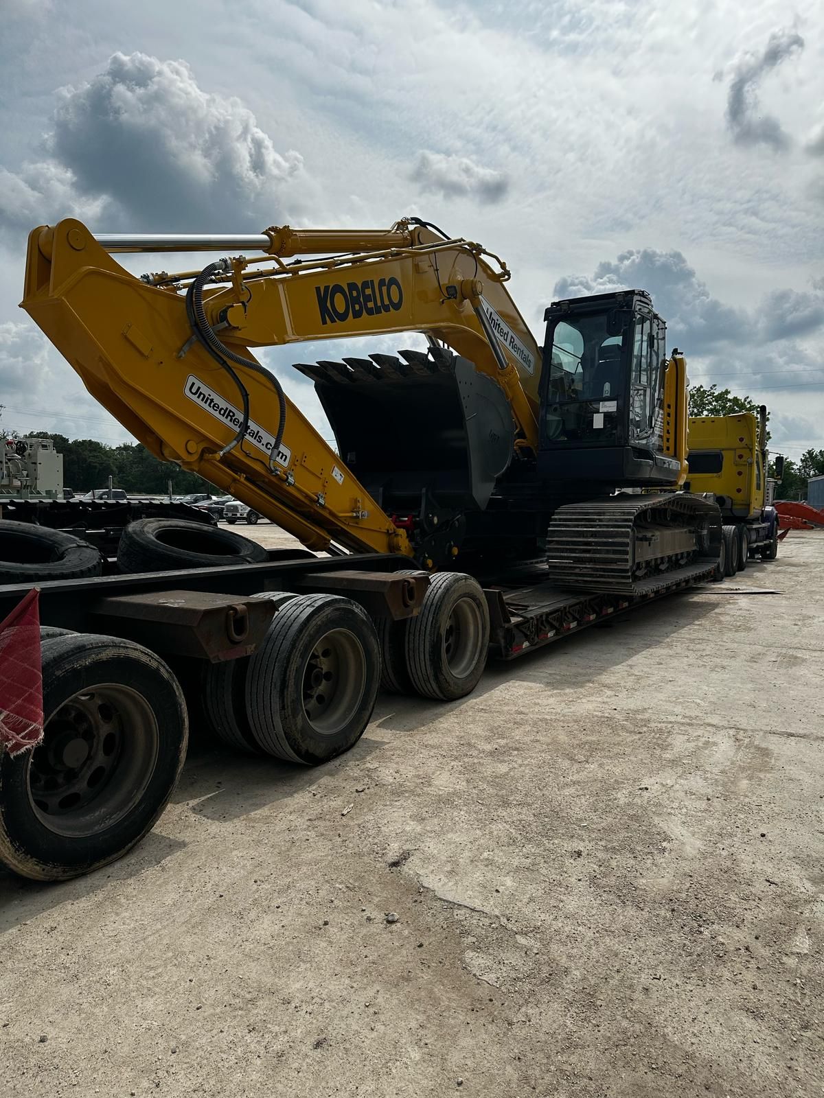 Kobelco excavator on specialized trailer