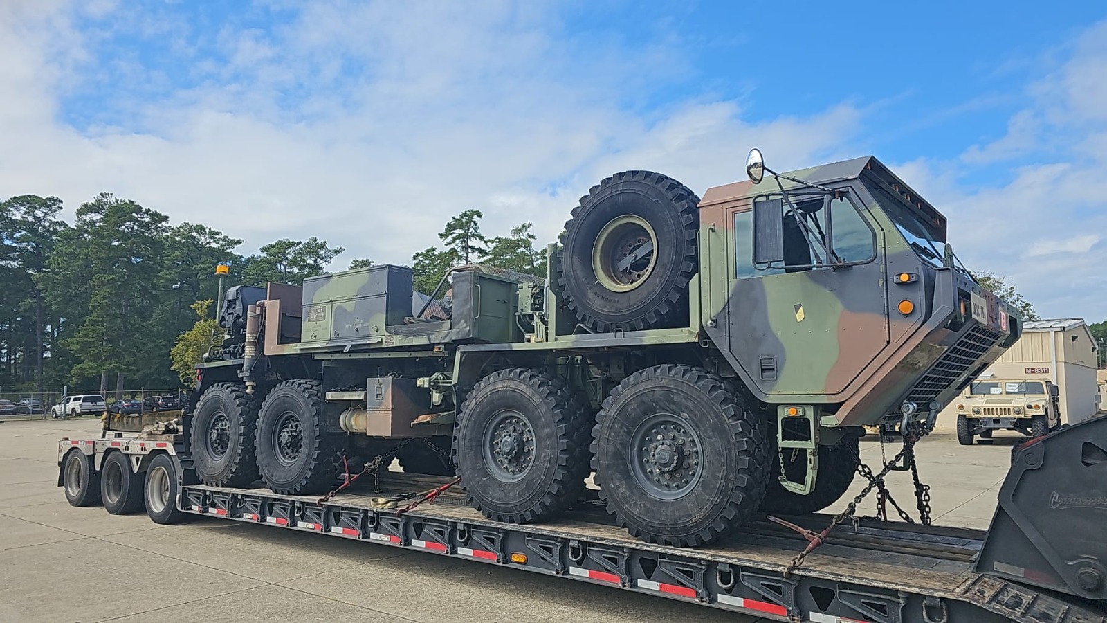 Military tank transport on heavy haul trailer